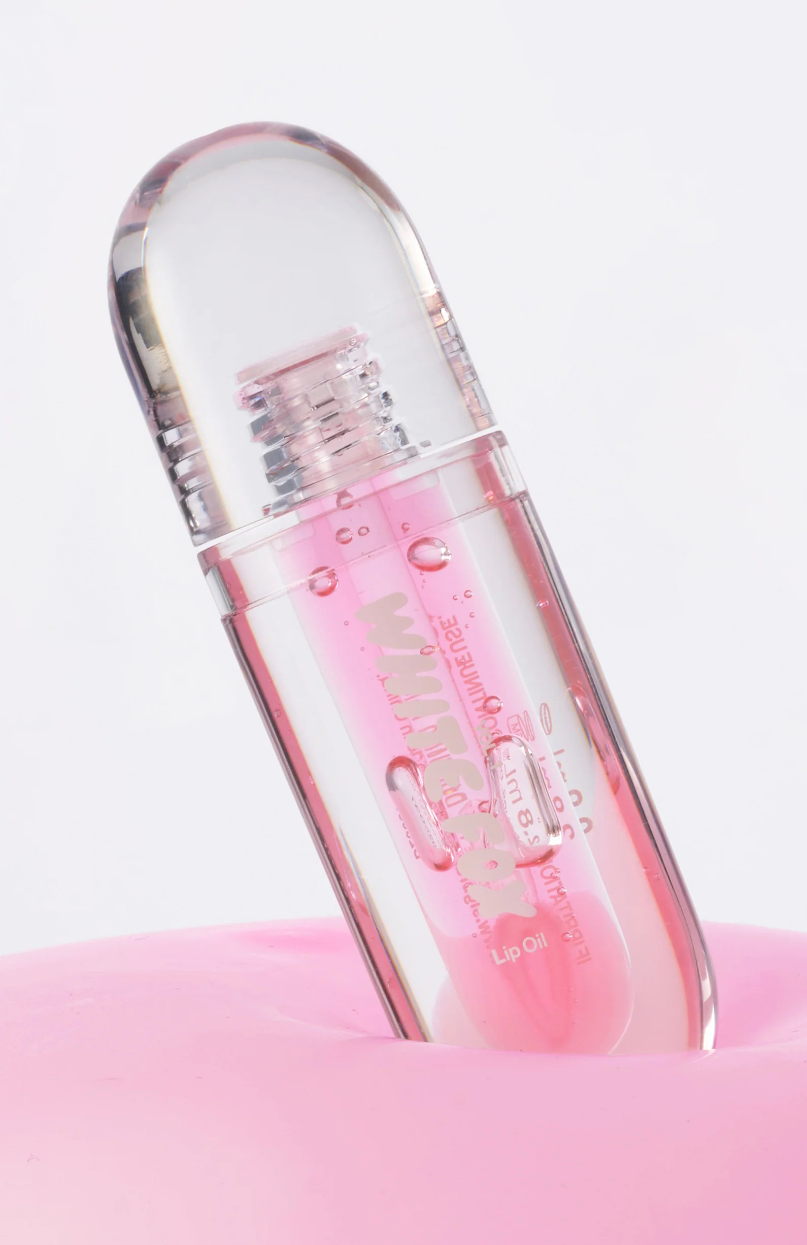 The Cosmetic Pouch & Lip Oil