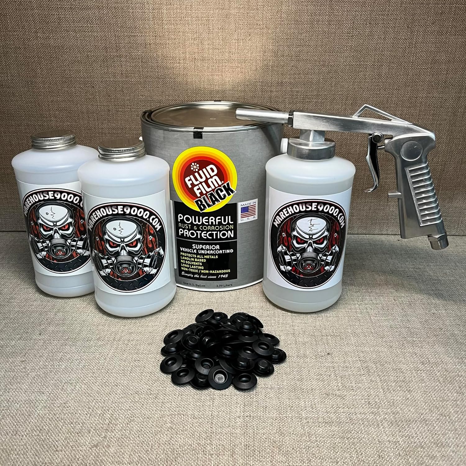 Fluid Film Black Gallon, Standard Economy Undercoating Spray Gun, 3 White Quart Bottles, and 50 Rust Plugs
