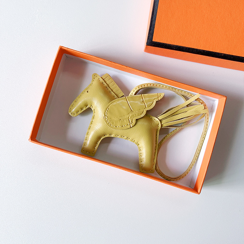 H Hand sewn pony pendant