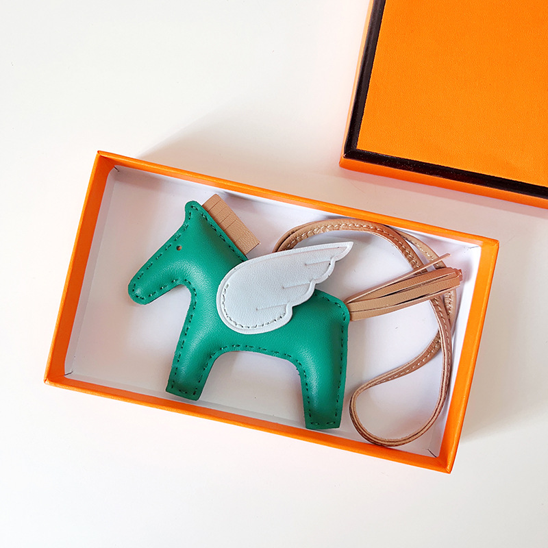 H Hand sewn pony pendant