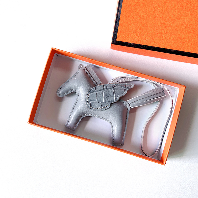 H Hand sewn pony pendant