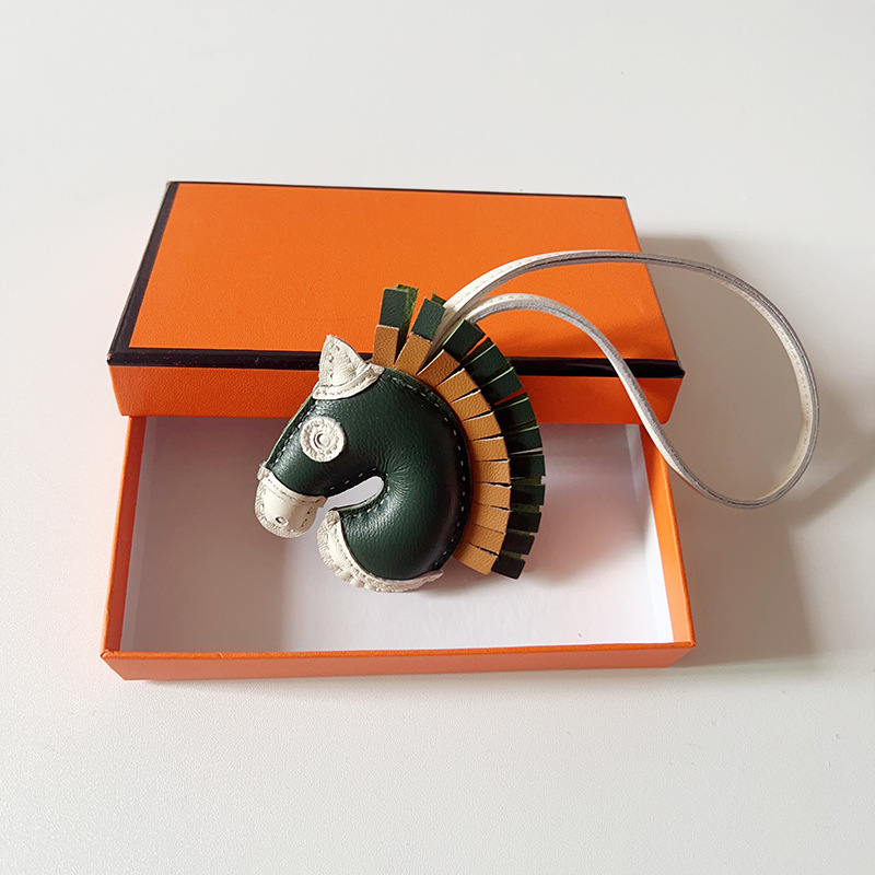 Handsewn unicorn pendant