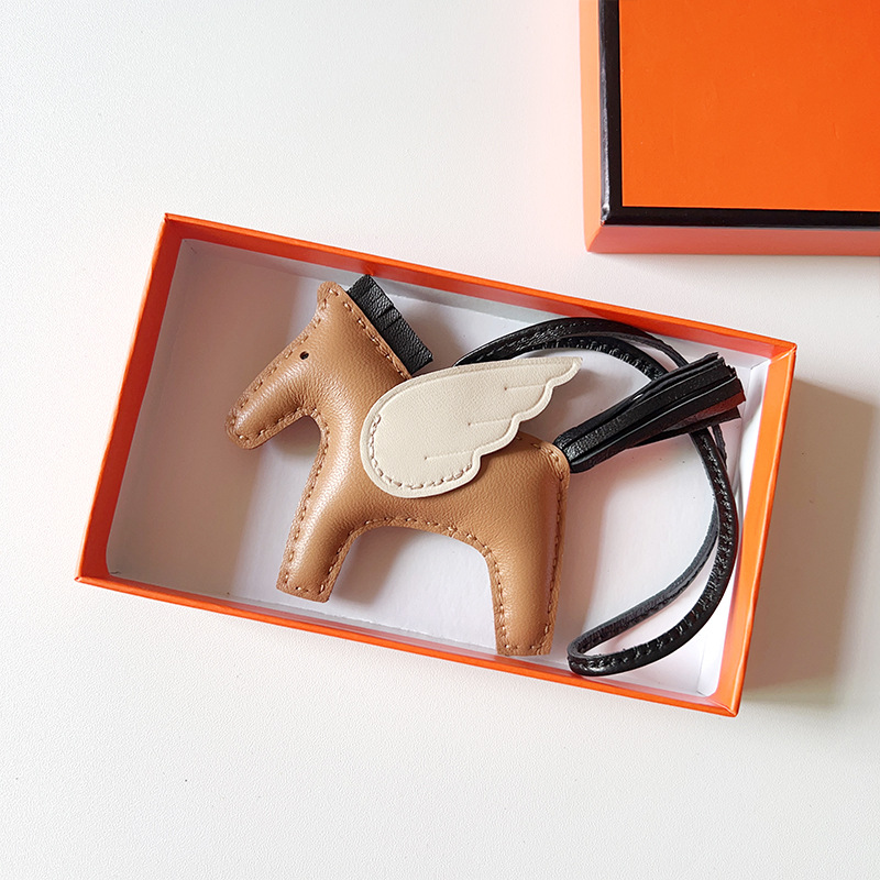 H Hand sewn pony pendant