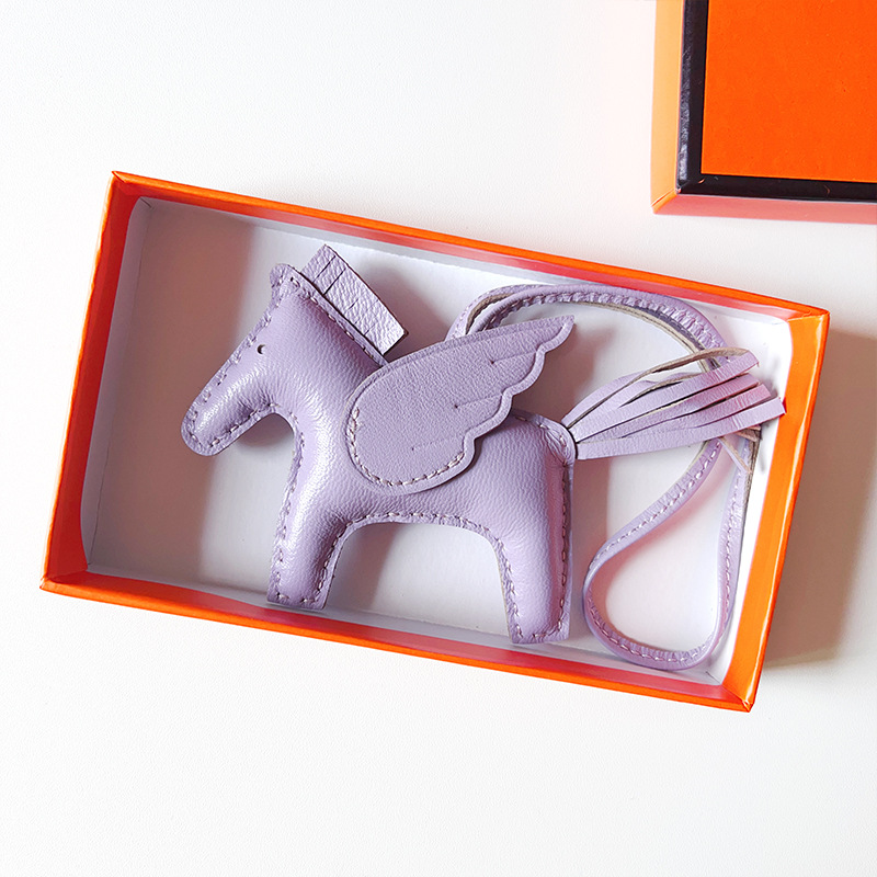 H Hand sewn pony pendant